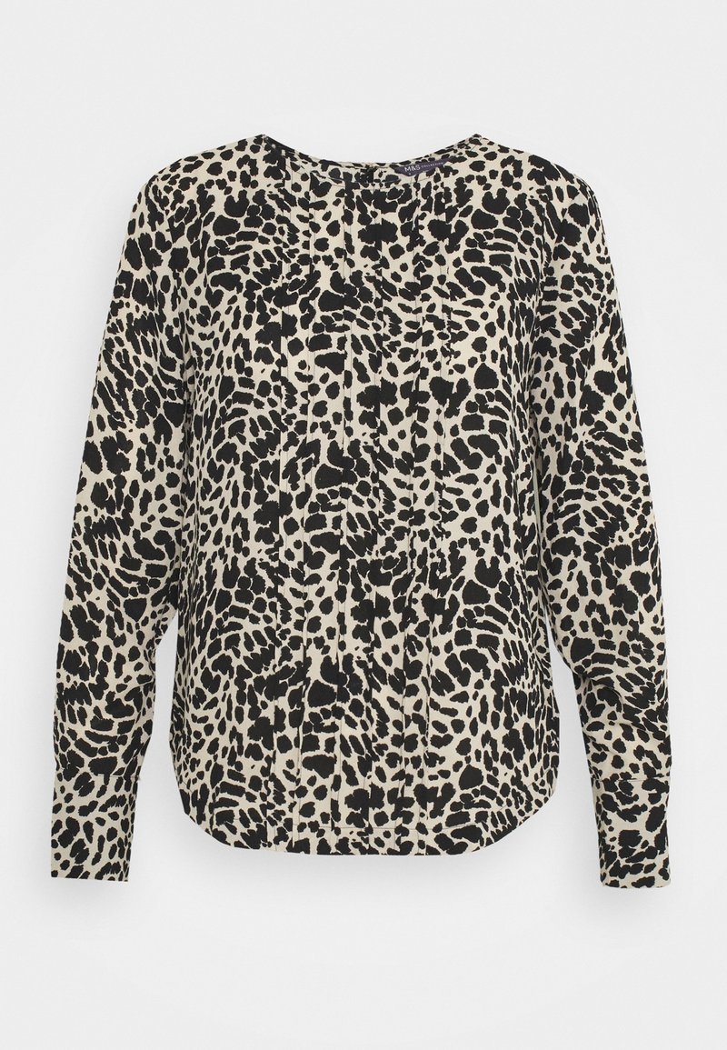 Blouse à manches longues beige avec imprimé léopard noir, dotée d'un col rond et d'une coupe décontractée, confectionnée dans un tissu lisse et léger.