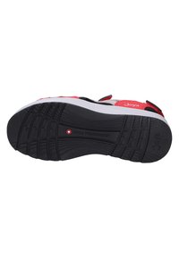Black rubber outsole with textured tread, featuring a white midsole and red accents. Brand name "Joya" and "Swiss Technology" embossed.
