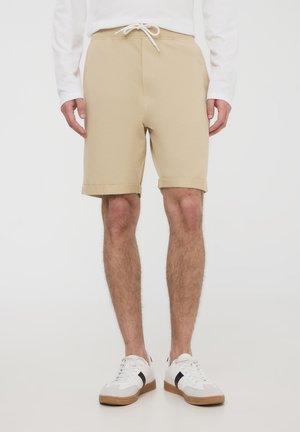 - Spodnie treningowe