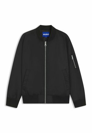 Zwarte bomberjack met een geribde kraag en manchetten. Voorzien van een ritssluiting aan de voorkant en zijzakken. Glad materiaal met een gestructureerd ontwerp.