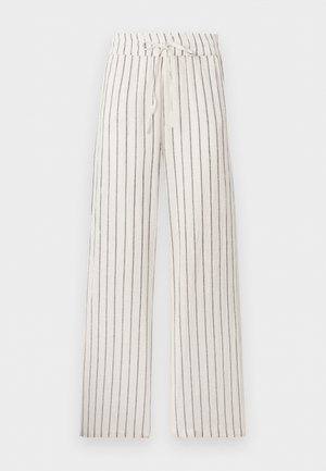 Pantalon blanc à jambes larges avec fines rayures verticales noires et taille à cordon.
