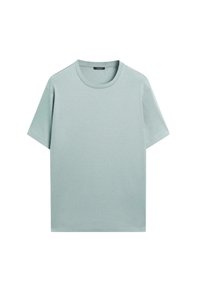 Ljusgrå kortärmad t-shirt med rund hals, liggande platt mot en vit bakgrund.
