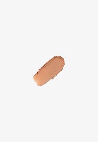 Cremiger Bronzer Swatch in einem warmen, hellbraunen Farbton mit glatter Textur und subtiler Schimmer, aufgetragen in einer länglichen ovalen Form.