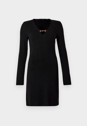 Zwarte lange mouw jurk met een V-halslijn en een metallic accentdetail op de borst. Glad textuur en nauwsluitend ontwerp.