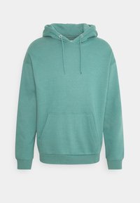 Felpa con cappuccio in un morbido tessuto teal, caratterizzata da una tasca a marsupio, cordini regolabili e polsini e orlo a costine.