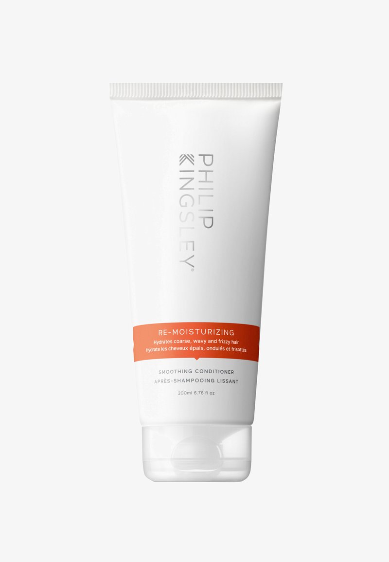 Glättende Spülung in einer weißen Tube mit orangefarbenem Etikett. Enthält Produktdetails in Englisch und Französisch. Größe: 200 ml.