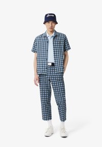 Lacoste Sport SHORT SLEEVES - Pikeepaita - bleu clair t