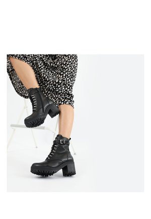 Platform ankle boots - czarny 6406551-36