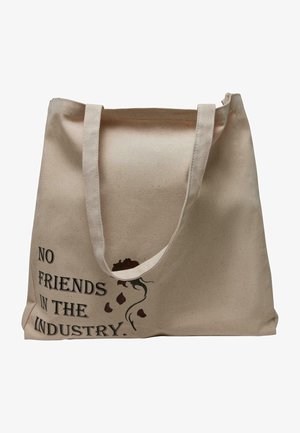 Sac en toile beige avec de longues anses, arborant le texte imprimé "PAS D'AMIS DANS L'INDUSTRIE" et un graphique de rose en rouge foncé et vert.