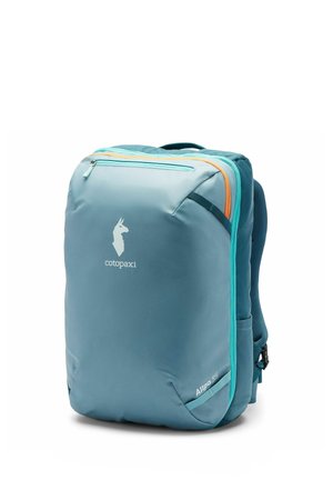 Blue Cotopaxi Allpa 35 backpack with teal and orange zippers and padded shoulder straps standing upright on white background.
