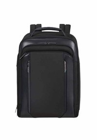 Zaino nero realizzato in tessuto resistente, dotato di un compartimento principale con zip, una tasca frontale, spallacci imbottiti e una maniglia superiore.