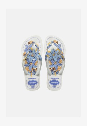 Białe klapki japonki z niebiesko-brązowymi kwiatowymi wzorami i białymi paskami, z oznaczeniami marki Havaianas i rozmiaru na podeszwach.