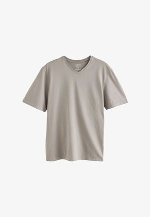 Smėlio spalvos trumpomis rankovėmis medvilniniai V formos iškirpte marškinėliai vidutinio dydžio, įprasto silueto, pateikti ant baltos fono.