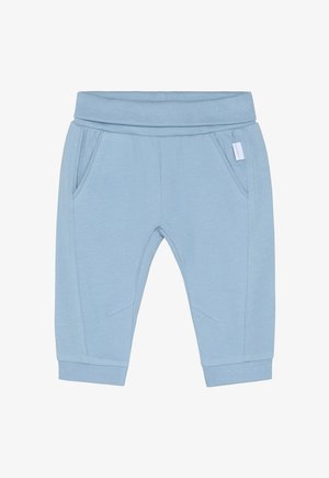 Lichtblauwe joggingbroek gemaakt van zachte stof, met een elastische tailleband, zijzakken en taps toelopende boorden met subtiele stikseldetails.