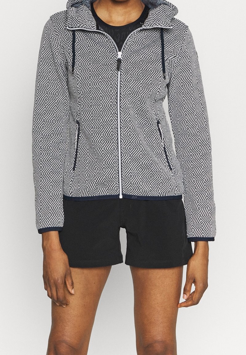 Giacca con cappuccio e zip, con un motivo geometrico bianco e nero, dotata di tasche, bordo a contrasto, tessuto texturizzato e maniche lunghe.