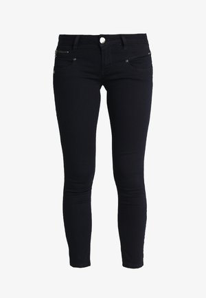 Jeans skinny neri realizzati in denim. Presentano una forma aderente, tasche frontali e un dettaglio con tasca con zip in vita.