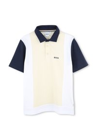 Πόλο μπλουζάκι σε λευκό, απαλό κίτρινο και ναυτικό μπλε. Σχεδίαση τριών χρωμάτων με κοντά μανίκια και κλασικό γιακά. Διαθέτει δύο κουμπιά και λογότυπο.