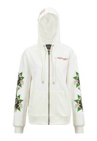 Sudadera blanca con cremallera que presenta gráficos de estilo tatuaje floral en negro, rojo y verde en ambas mangas. Material suave y diseño con capucha.