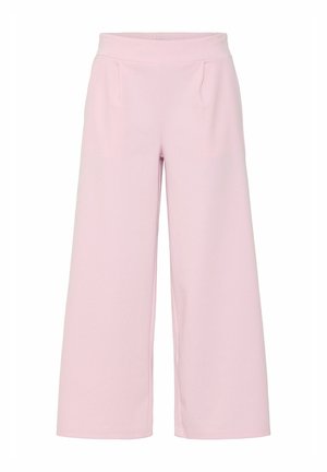 Wide-leg trousers in soft pink fabric with a smooth texture. Features a high waist and two front pockets. Simple, tailored design.
