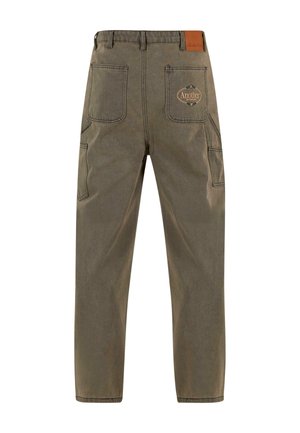Dark green cargo pants made of durable fabric, featuring multiple pockets, a fitted waist, and a small leather patch with text accent.