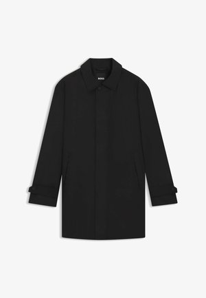 Black, waterproof coat with a collared neckline, button closure, and side pockets. Features rolled sleeves with button accents.