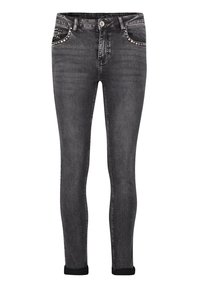 Černé skinny džíny s jemnou texturou, zdobené předními kapsami s stříbrnými hroty a klasickým zapínáním na knoflík a zip.