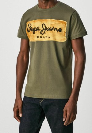 Olchowa bawełniana koszulka z krótkim rękawem i okrągłym dekoltem, z wyrazistym żółto-czarnym logo "Pepe Jeans London".