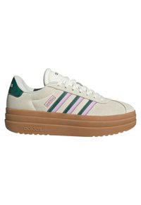 White suede sneakers with green and pink stripes, rubber gum sole, and padded collar; features Adidas logo on tongue and heel.
