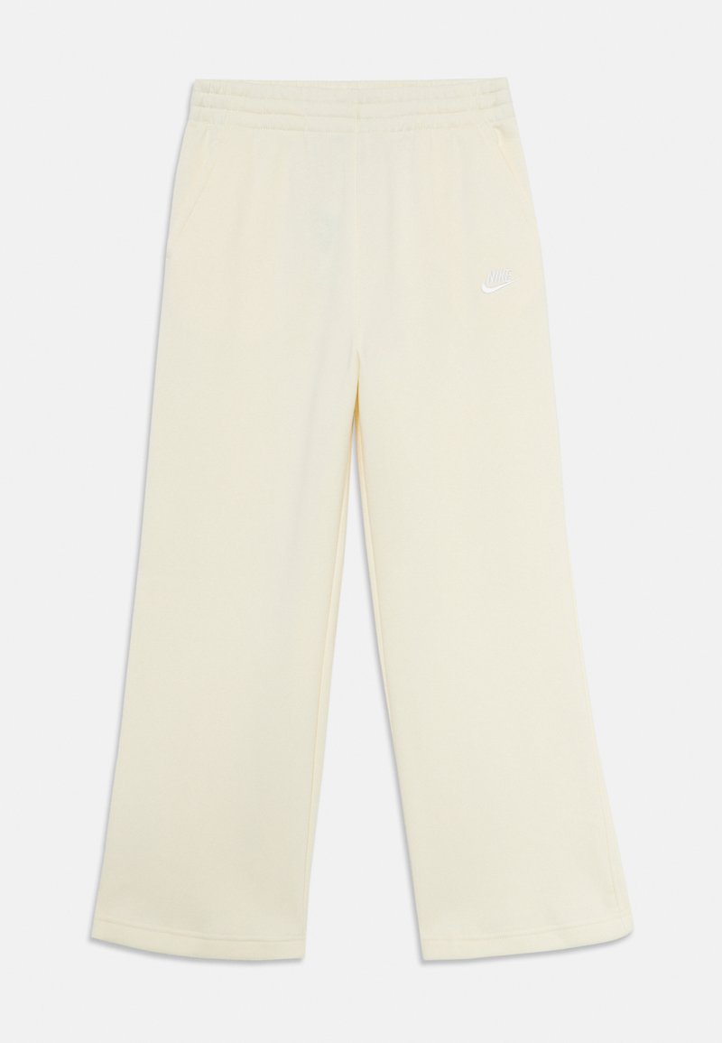 Calças de moletão largas em off-white com cintura elástica, bolsos laterais e pequeno logótipo branco da Nike na coxa esquerda.