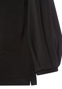Black long-sleeve top featuring a textured fabric, gathered balloon sleeves, and side slits at the hem for added movement.