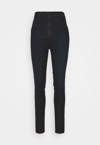 Tmavě modré džíny s vysokým pasem a slim fit střihem. Vyrobené z denimu, s hladkou texturou a jednoduchým designem bez viditelných vzorů nebo akcentů.