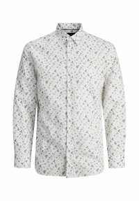 Pitkähihainen nappi-ylöspaita, joka on valmistettu kevyestä kankaasta. Paidan tausta on valkoinen ja siinä on pieniä kukkakuoseja hillityissä väreissä.