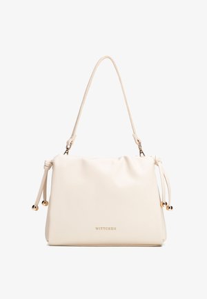 Sac à bandoulière en cuir couleur crème avec des sangles latérales nouées, des accents dorés et le logo "WITTCHEN" embossé à l'avant.