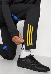 adidas Performance MANCHESTER UNITED PANT - Klubu apģērbs - black/blue/tribe yellow