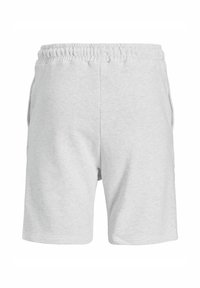 Pantalones cortos de color gris claro, hechos de una suave tela de jersey, con una cinturilla elástica y dos bolsillos laterales. Diseñados para la comodidad y el uso casual.