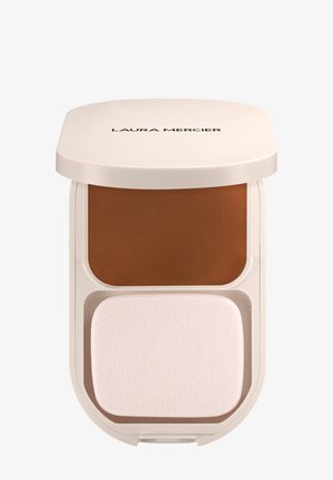 Poudre de maquillage compacte beige de Laura Mercier avec miroir et applicateur en éponge rectangulaire blanc à l'intérieur.