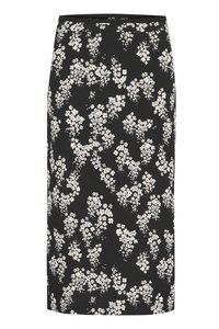 Fekete ceruzaszoknya fehér virágmintával, texturált anyagból, középvádli hosszúságú és testre simuló, sima derékpánttal.
