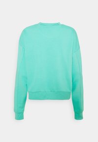 Felpa corta verde menta con una texture morbida, scollatura rotonda e maniche lunghe. Presenta una vestibilità leggermente oversized e cuciture in evidenza.