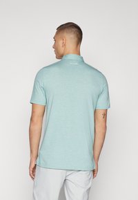 TravisMathew THE ZINNA - Polotričko - heather beryl green