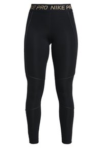 Czarne legginsy Nike Pro z wysokim stanem, złote logo "NIKE PRO" na elastycznym pasku oraz szczegółowe przeszycia na nogawkach.