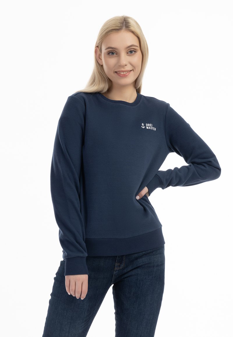Felpa blu navy con polsini e orlo a costine, presenta un piccolo logo di ancora bianco e la scritta "DREI MASTER" sul petto. Tessuto morbido e testurizzato.