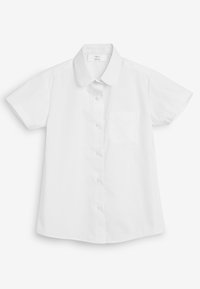 Camicia bianca a maniche corte in cotone, con colletto, chiusura frontale con bottoni e una tasca sul petto. Texture liscia.