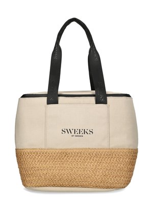 Canvas tote bag with a cream upper section and woven natural fiber bottom. Features black handles with branding. Zippered closure at the top.