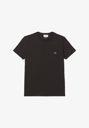 Zwarte katoenen t-shirt met korte mouwen en een ronde hals. Bevat een klein groen Lacoste krokodillenlogo op de borst. Soepele textuur.