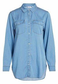 Chemise en denim bleu clair avec manches longues, boutonnage sur le devant, col pointu et deux poches poitrine. Présente des détails cousus et un ourlet arrondi.