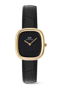 Montre Daniel Wellington avec un cadran carré noir, un boîtier doré, des aiguilles dorées et un bracelet en cuir noir avec texture couture.
