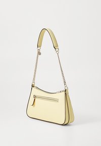 Yellow leather shoulder bag with a textured finish, curved shape, top zip closure, and a single chain-accented strap.