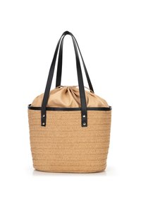 Tan woven tote bag with beige fabric drawstring closure and black shoulder straps, standing upright on a white background.