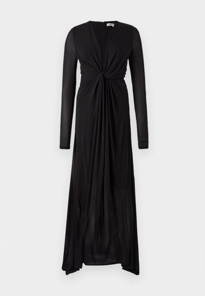 Czarna sukienka z długim rękawem, z węzłem z przodu i płynącym materiałem. Posiada głęboki dekolt w serek oraz stopniowany dół, co zapewnia eleganckie układanie się.