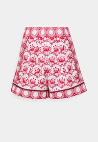 Shorts blancs avec broderie florale rouge et accents circulaires. Présente une ceinture et un ourlet à motifs, fabriqués en tissu léger.